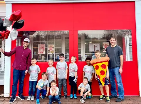 A youth team at a Square Peg Tuesday fundraiser